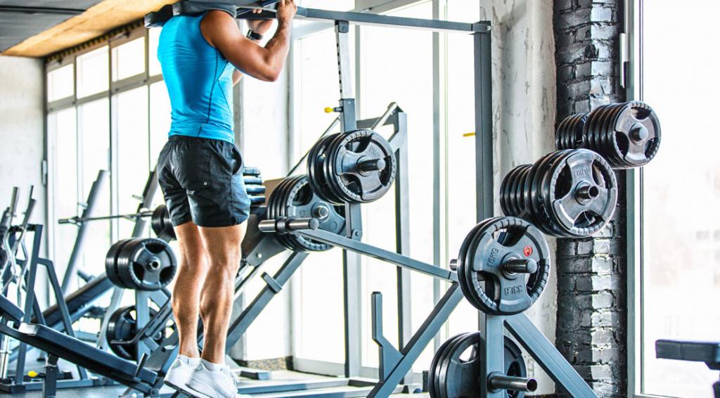 Подъемы на носки в тренажере