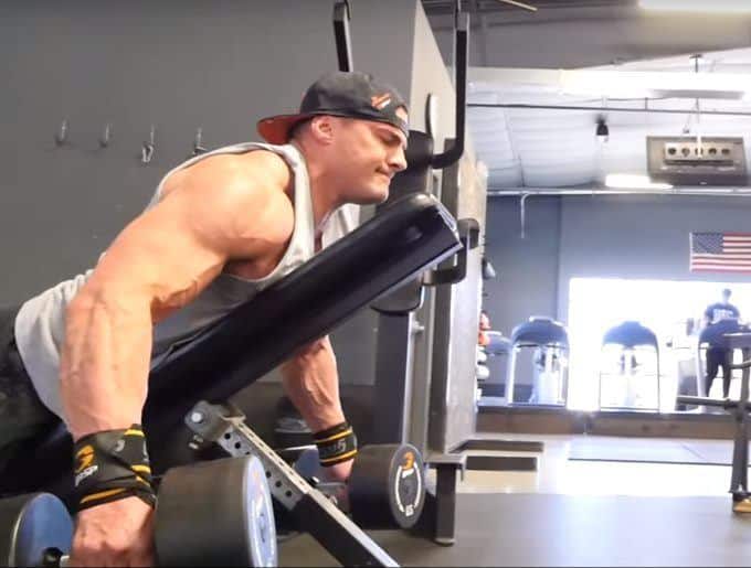 махи гантелями в наклоне